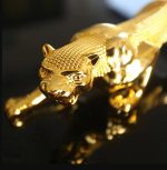 Panthère décorative en résine dorée, 6 cm