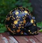 Tête de mort mexicaine en noir et doré, 14 cm de hauteur