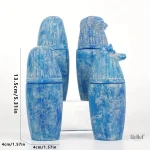 Accessoire de décoration égyptienne : 4 vases canopes élégants