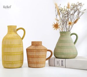 Vase antique en céramique verte de style grec