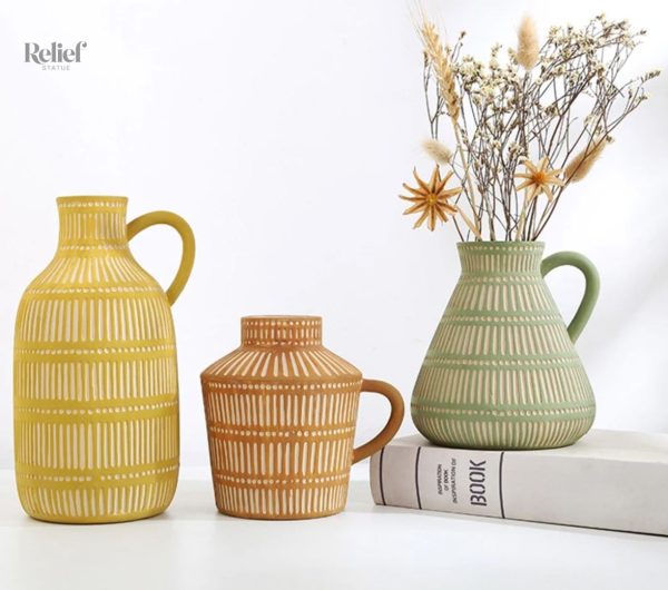 Vase antique en céramique verte de style grec